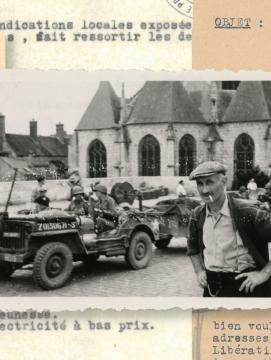 Photographie d'un FFI et des soldats américains à Nemours devant un ensemble de documents liés à l'épuration et la reconstruction