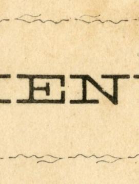 le mot menu est inscrit au centre et encadré d'une couronne végétale
