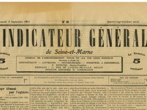 Détail montrant le titre et l'ours du journal