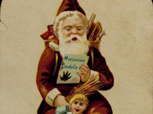 Le Père Noël corrigeant un enfant