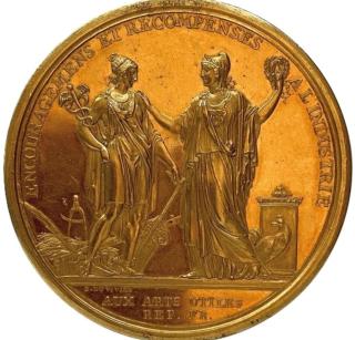 médaille dorée sur laquelle sont représentées deux figurees féminines et portant une inscription "encouragements et récompenses à l'industrie"