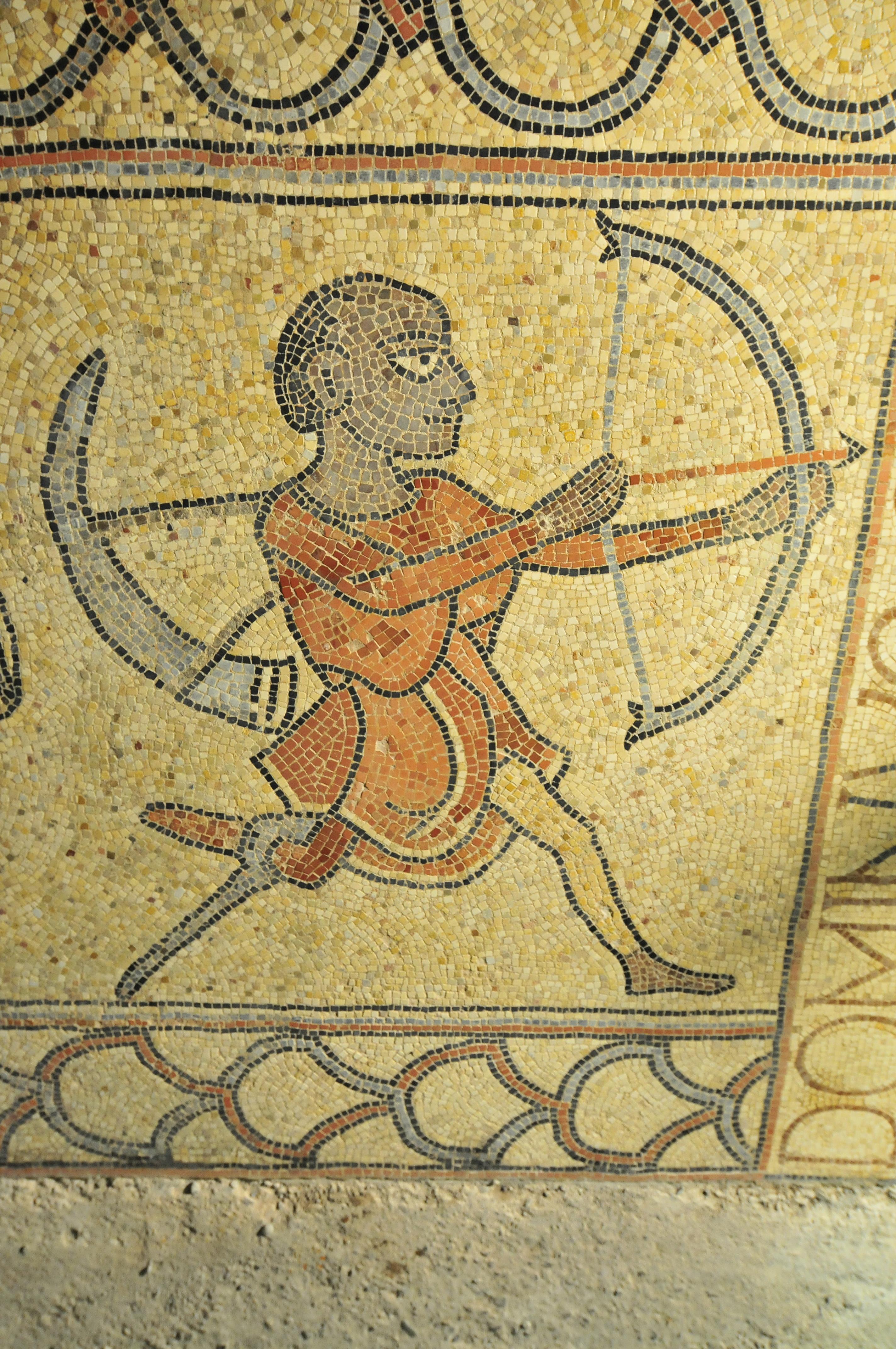 Mosaïque représentant un archer amputé d'une jambe. 